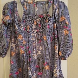 Cold shoulder shirt.